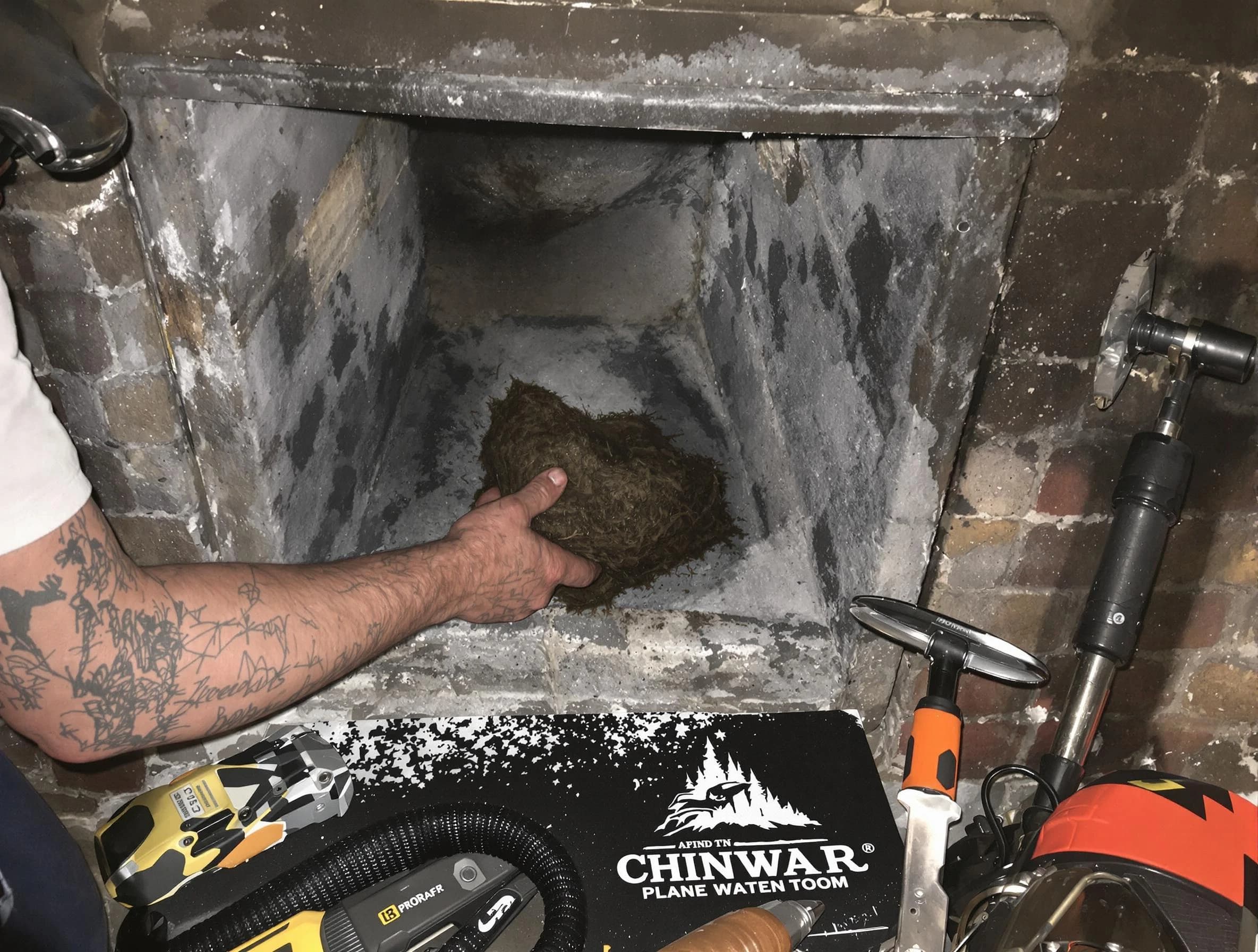 Guthrie Chimney Sweep safely removing debris and screening chimney in Guthrie, OK